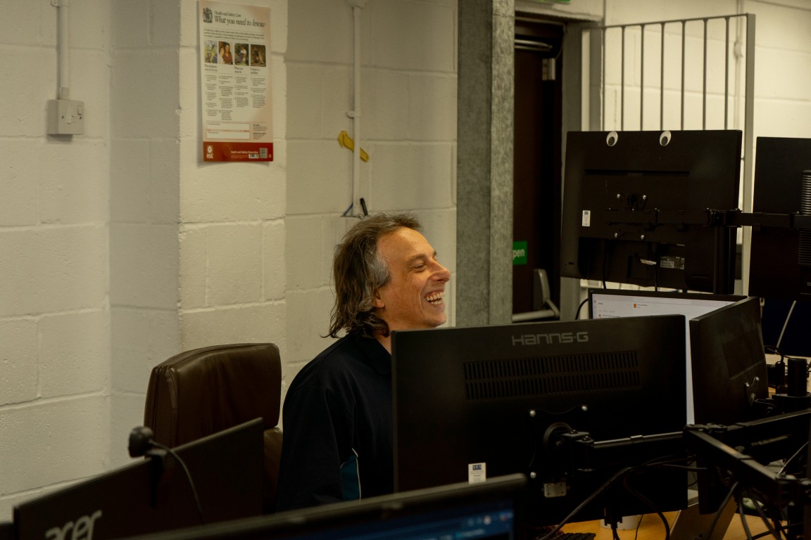Genmar IT security specialist reviewing cyber essentials requirements