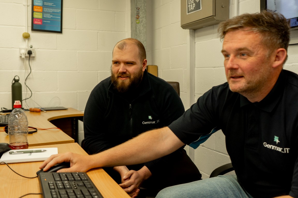Genmar IT project team planning IT infrastructure deployment