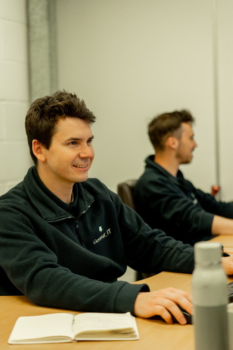 Genmar IT Microsoft specialists discussing Azure cloud solutions