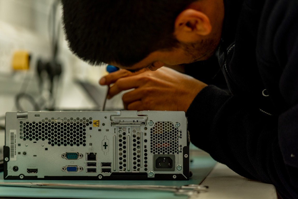 Hardware repair station at Genmar IT workshop