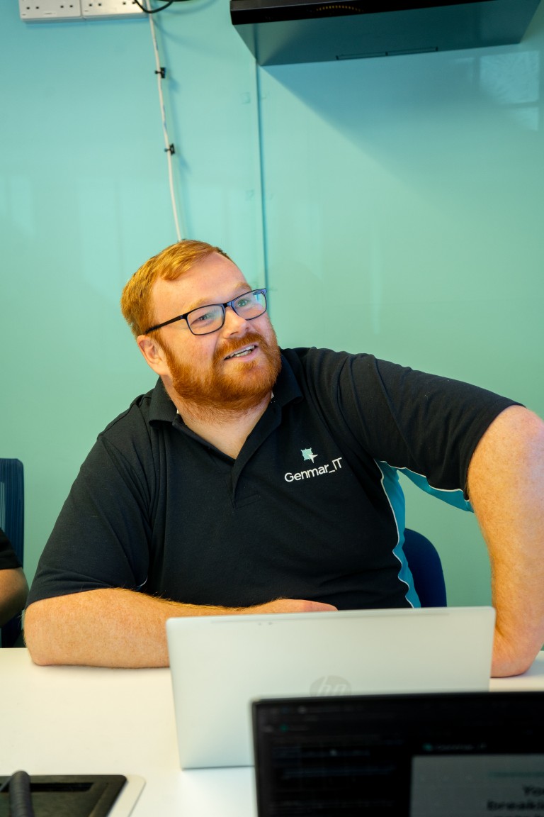 Genmar IT consultant discussing AI strategy